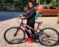She often cycles to remain in shape.
